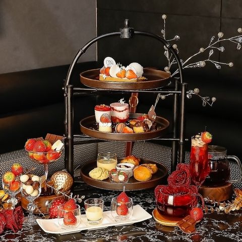 A luxurious afternoon tea filled with strawberries and chocolate