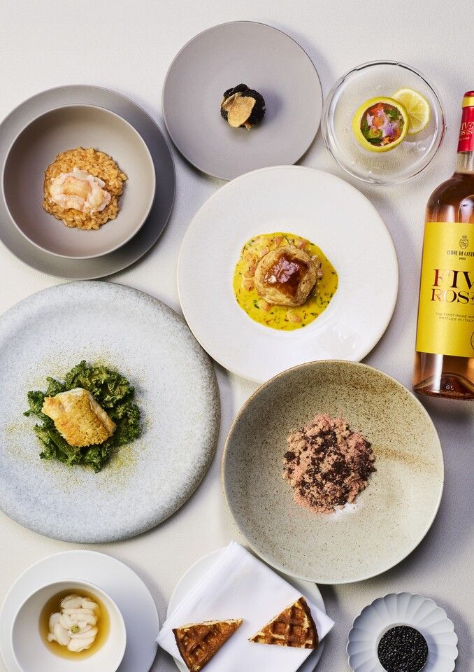 A luxurious French lunch featuring a 10-item appetizer platter and your choice of main course.