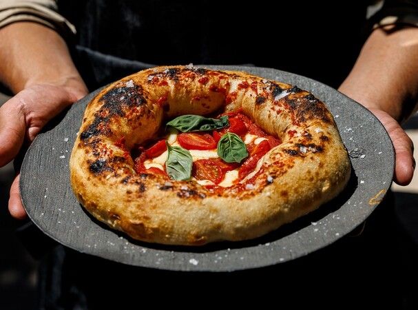Fire-cooked dishes and craft pizza Deca