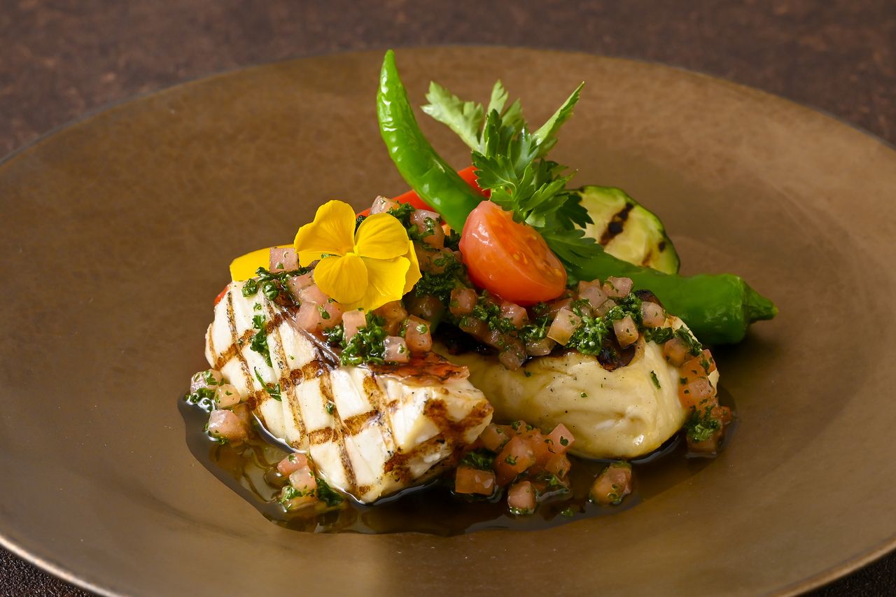 Grilled herb flavored fish of the day 