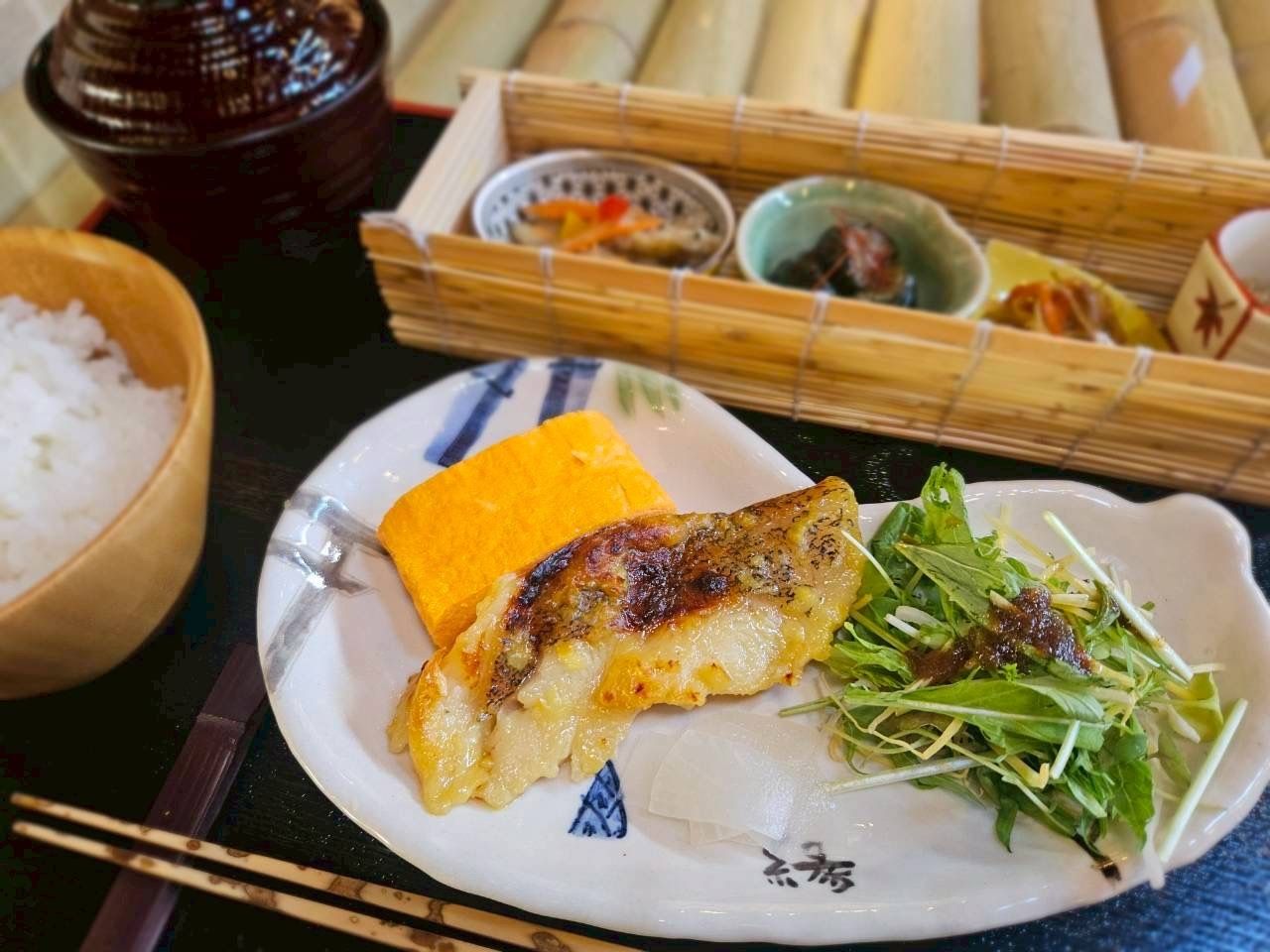 Silver flounder Saikyo-yaki set meal (includes rolled egg made with dragon eggs, side dishes, salad, and red miso soup)