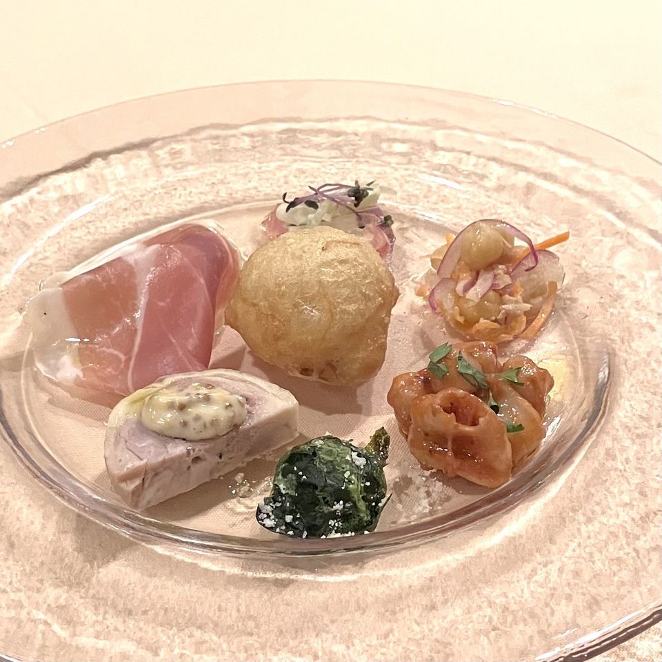 A la carte with an appetizer platter.